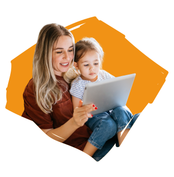 Woman and young girl looking at laptop